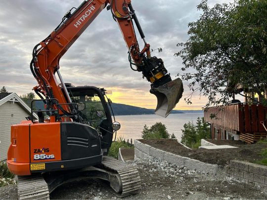 Gravemaskin i arbeid